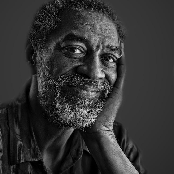 Alex Rivera, Lead Design Curator at TrailGardenBox, reviewing corporate floral arrangements